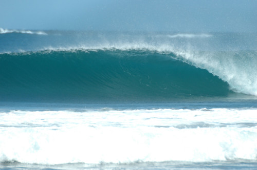 surfing wave at secret spot on the Nicoya Peninsula, near Tamarindo, Guancaste, Costa Rica.